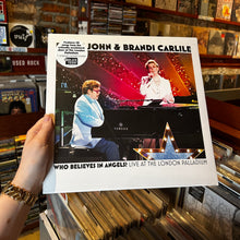 Load image into Gallery viewer, ELTON JOHN &amp; BRANDI CARLILE - WHO BELIEVES IN ANGELS? LIVE AT THE LONDON PALLADIUM [RSDBF25] (LP)
